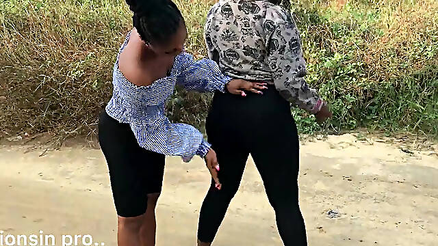 Black women kiss and lick each other's big boobs in outdoor lesbian play